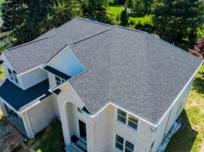 38063818 aerial view of asphalt shingles roofing construction the house with new window